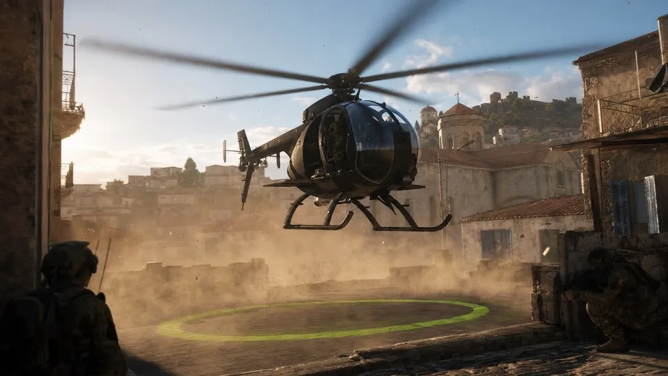 A helicopter hovering above a marked landing zone in a dusty town, with soldiers nearby.